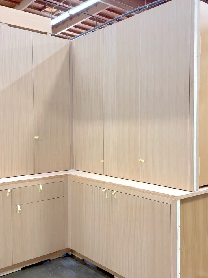 Custom craftsmanship at its finest. Designed with concealed interior drawers and a beautifully balanced layout, this custom closet is tailored to elevate everyday living. Thoughtfully selected countertop and the push to open mechanism will complete t