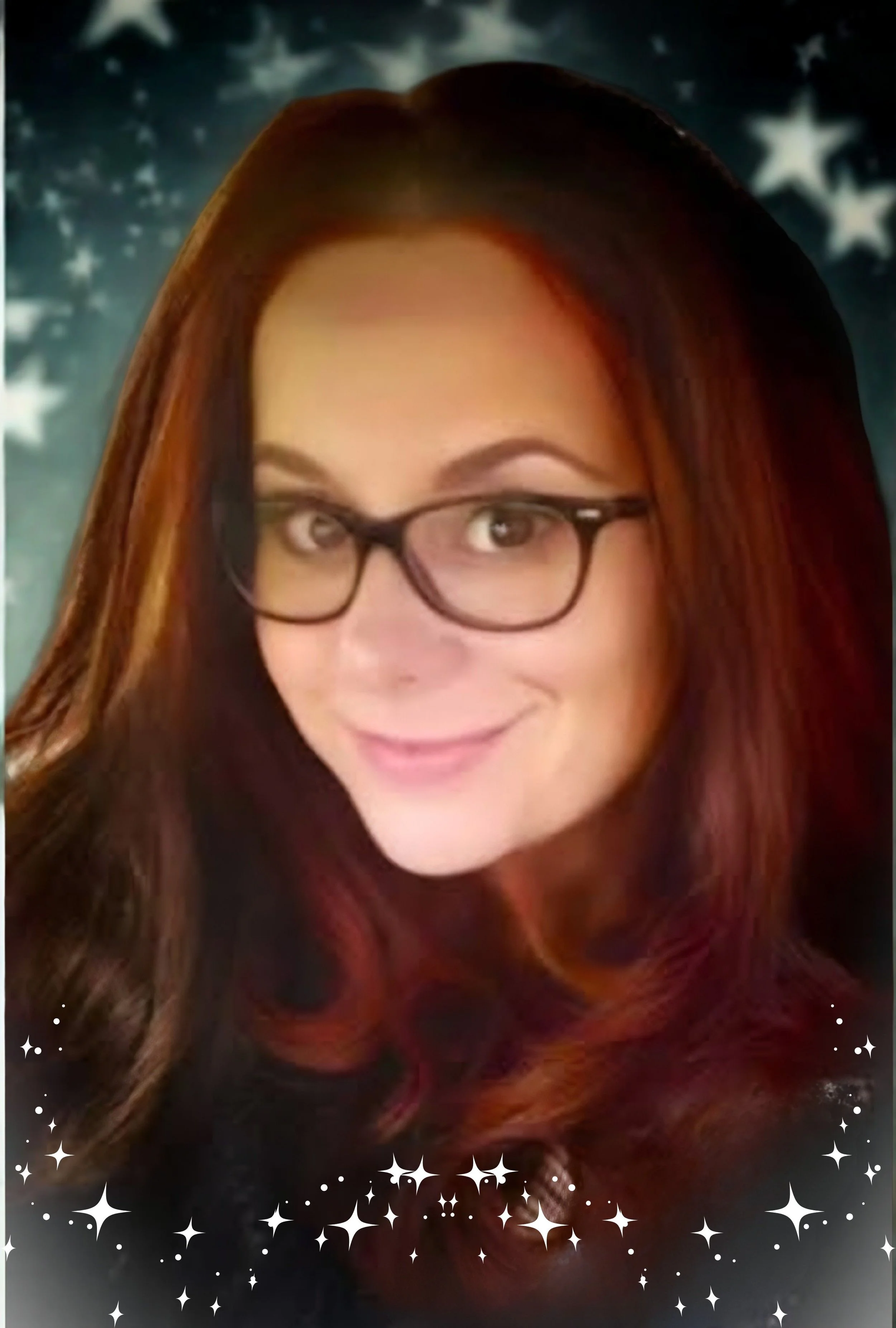 A woman with long reddish hair and glasses smiling, digital stars border the bottom of the photo.