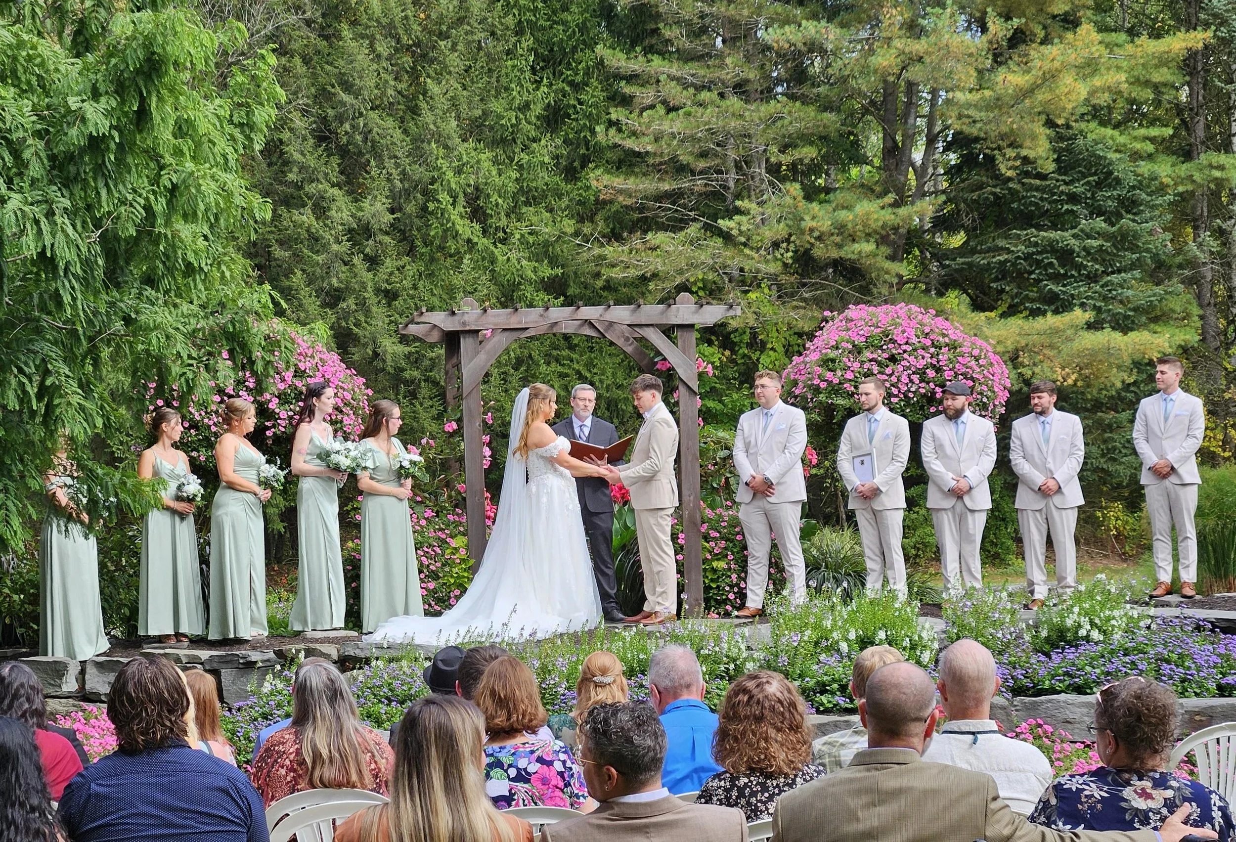 Outdoor wedding ceremony with flowers