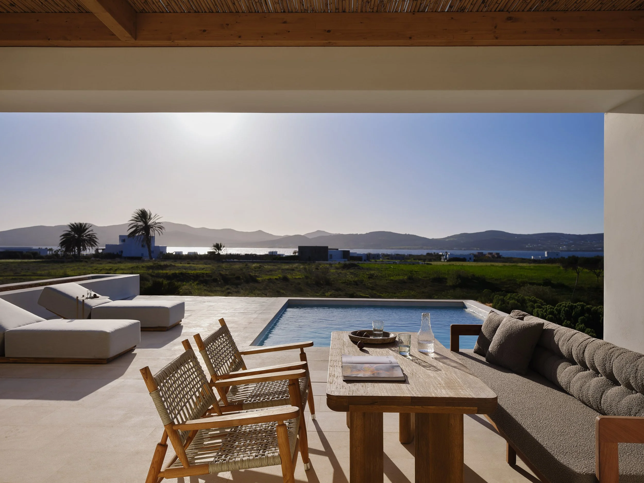 Grand-Suite-Outside-Area-Pool-Seating-Sea-View.jpg
