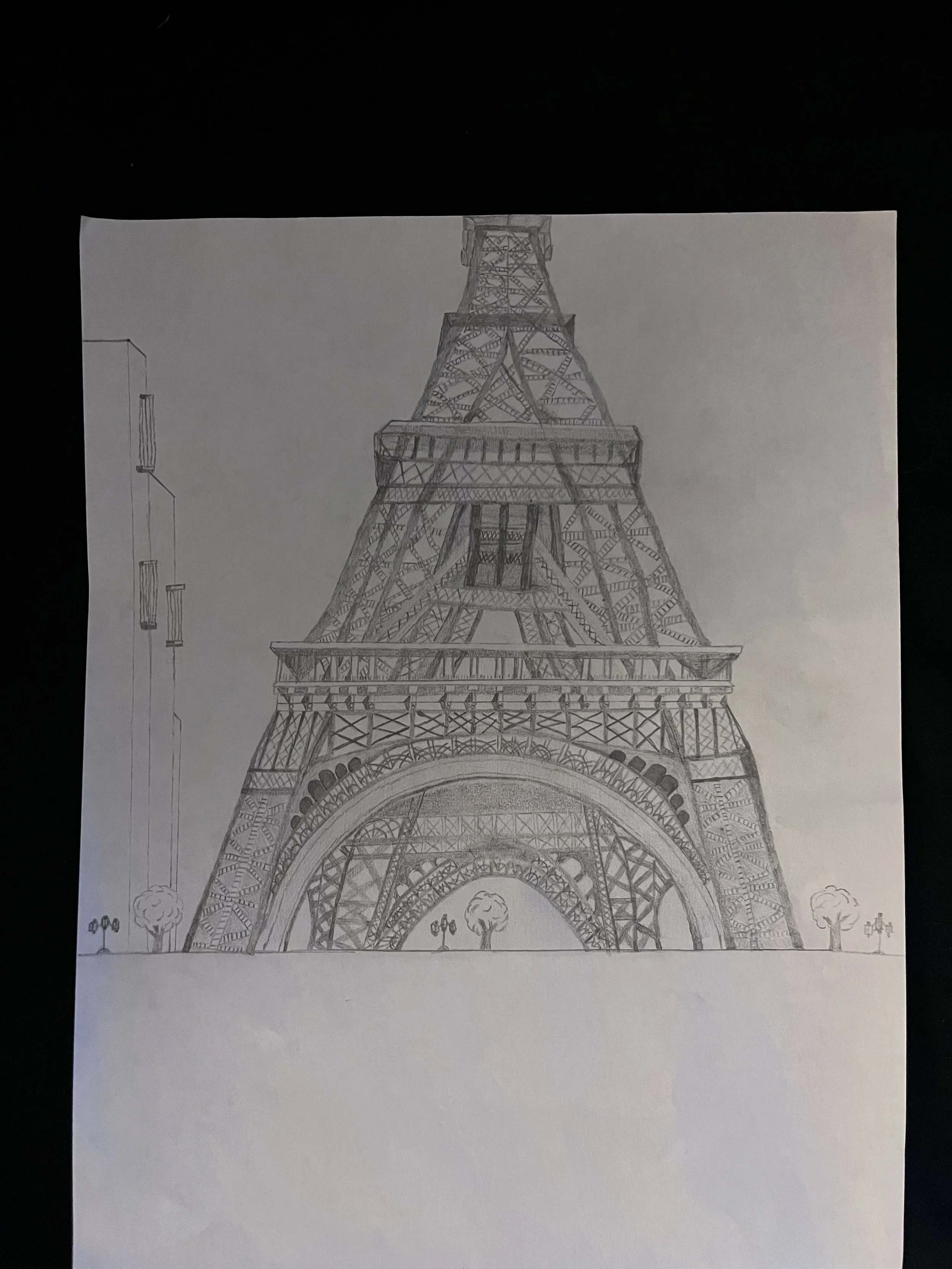 06/15/2026 An 8.5x11" pencil & eraser drawing of beneath the Eifel Tower