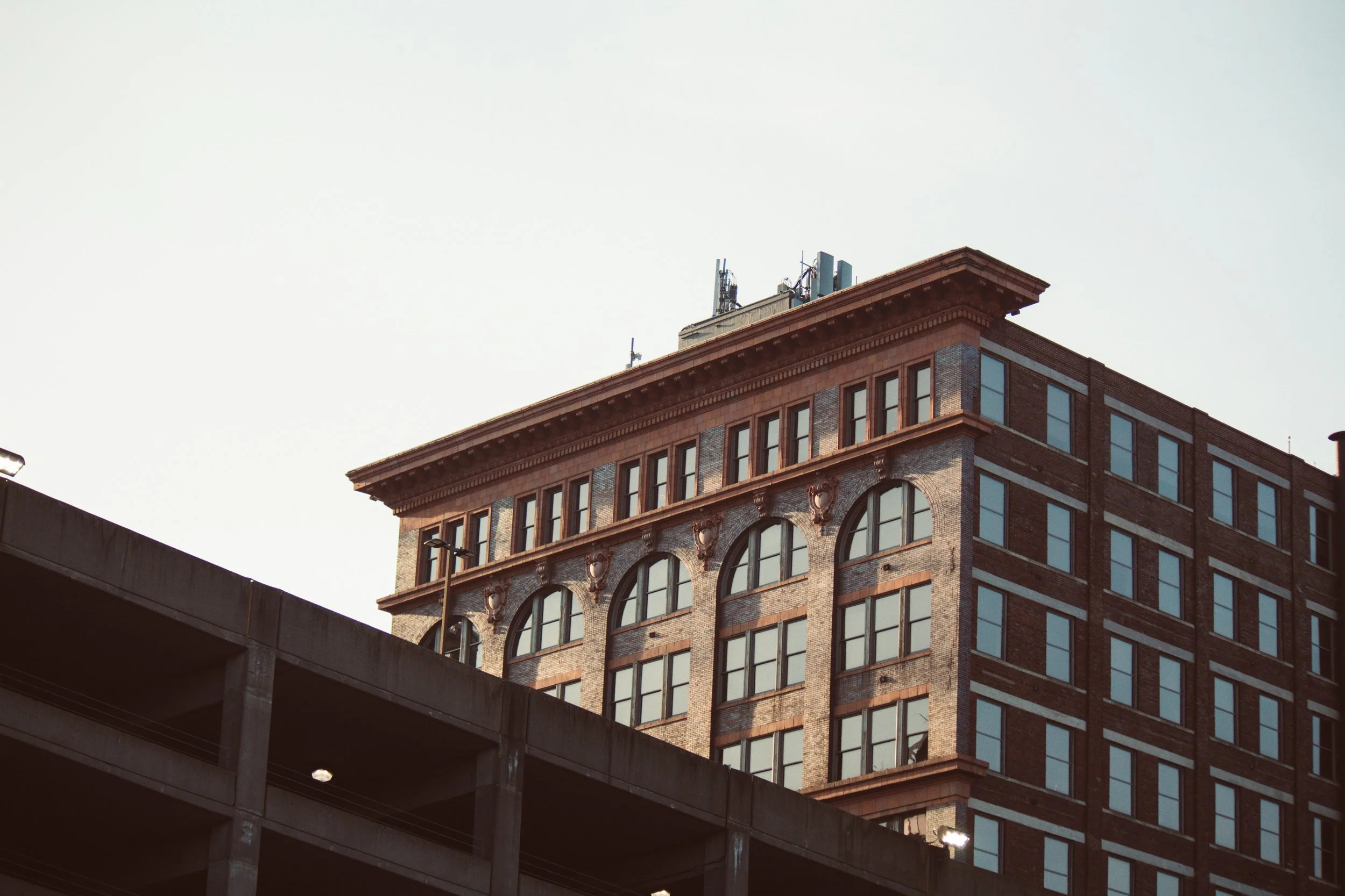 Historic brick building with arched windows in downtown Cincinnati
