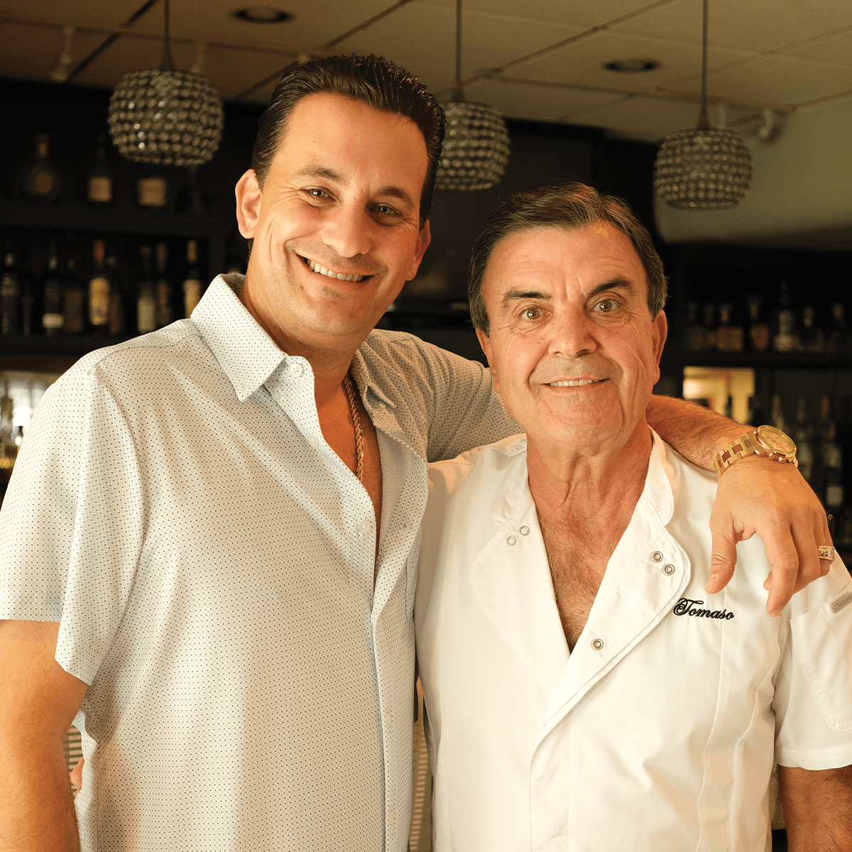Chef Joey and Chef Tomaso together in a restaurant