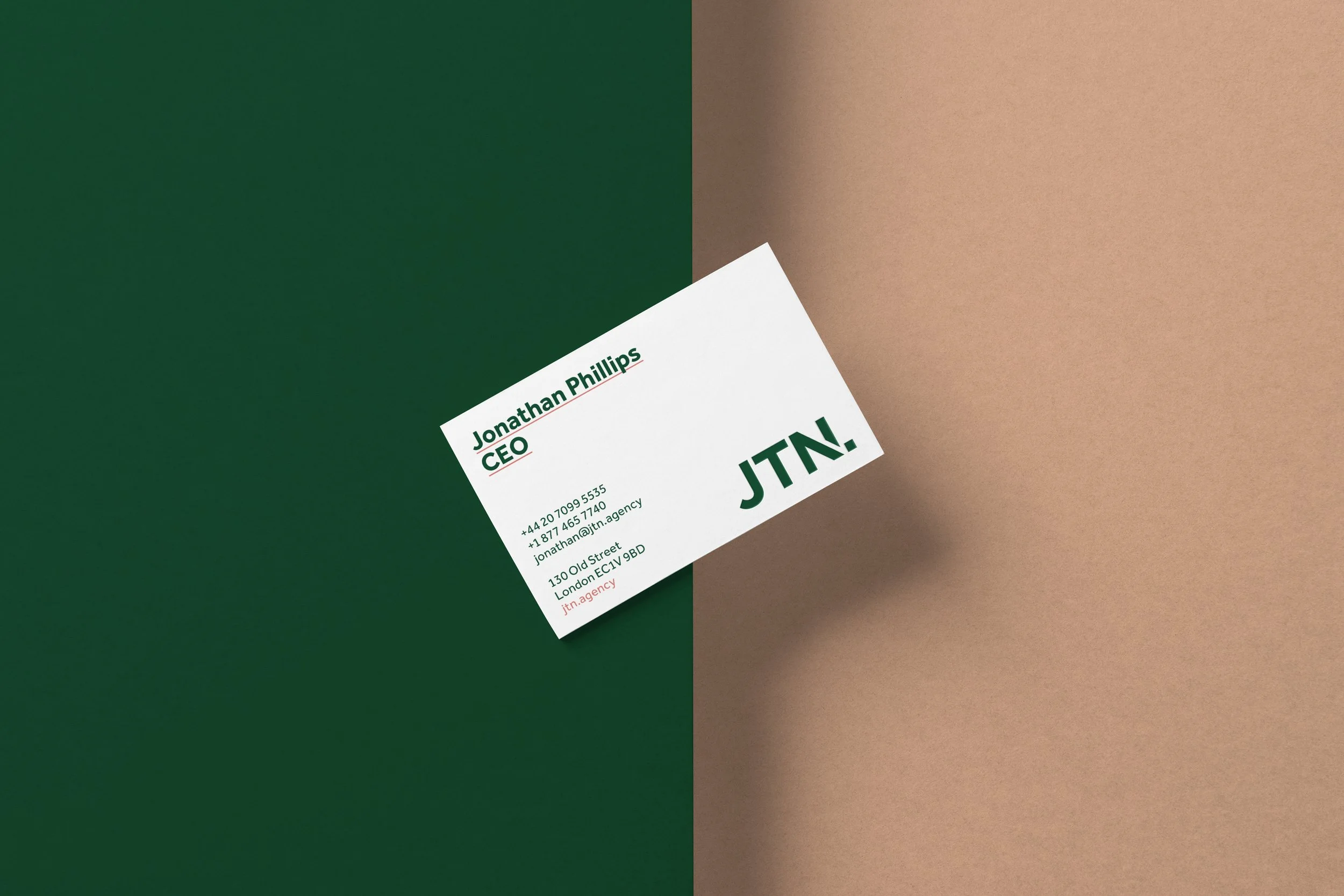 modern designed business card laying on 2 colour background
