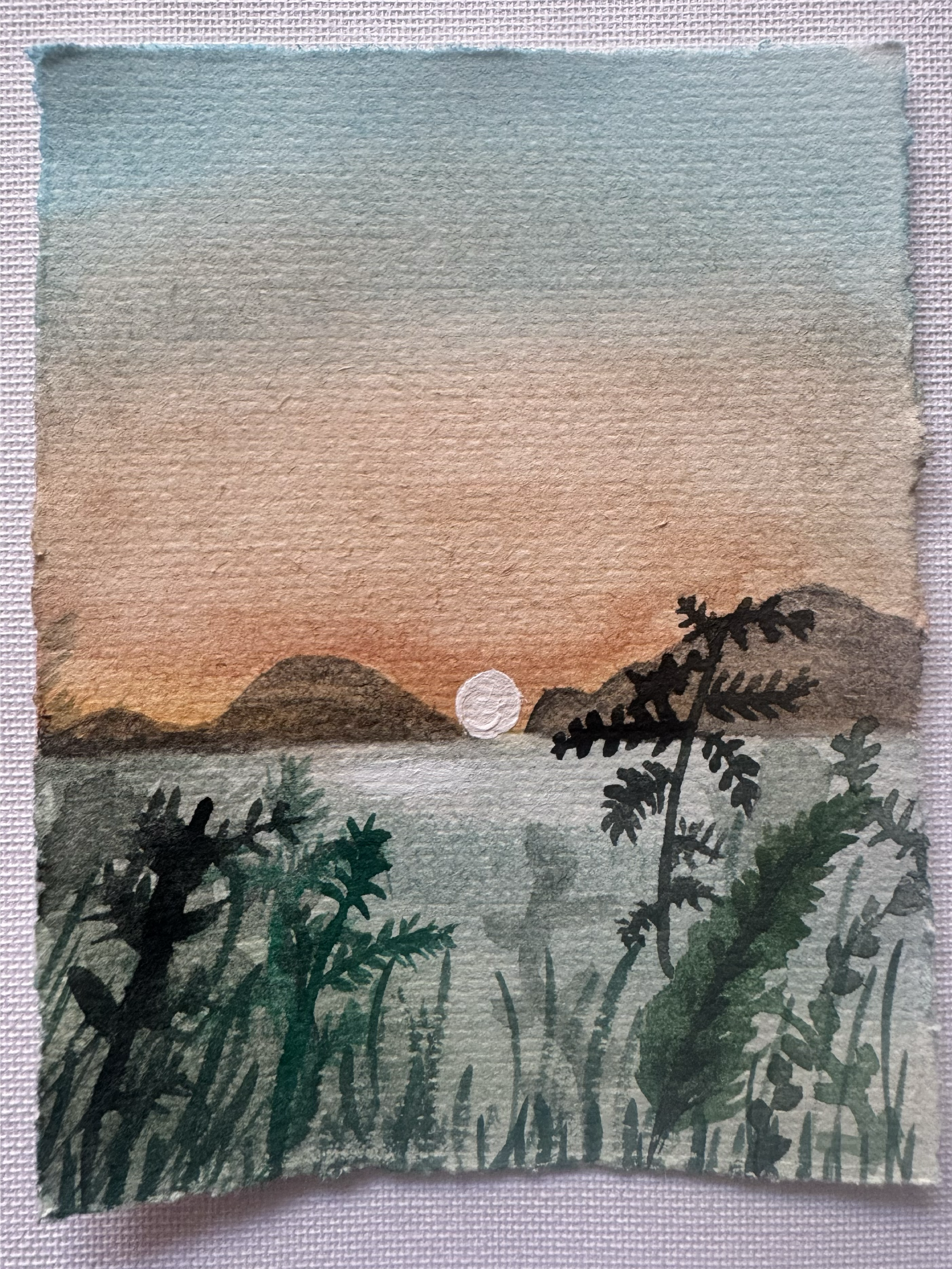 Watercolor landscape with trees, hills, and a setting sun at dusk.