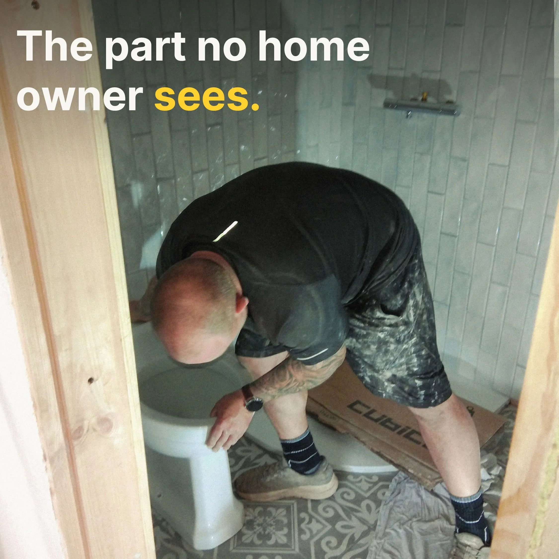 A man taking a selfie in a bathroom mirror, showing his bald head and upper body. The image has a text overlay that says 'The part no home owner sees'.
