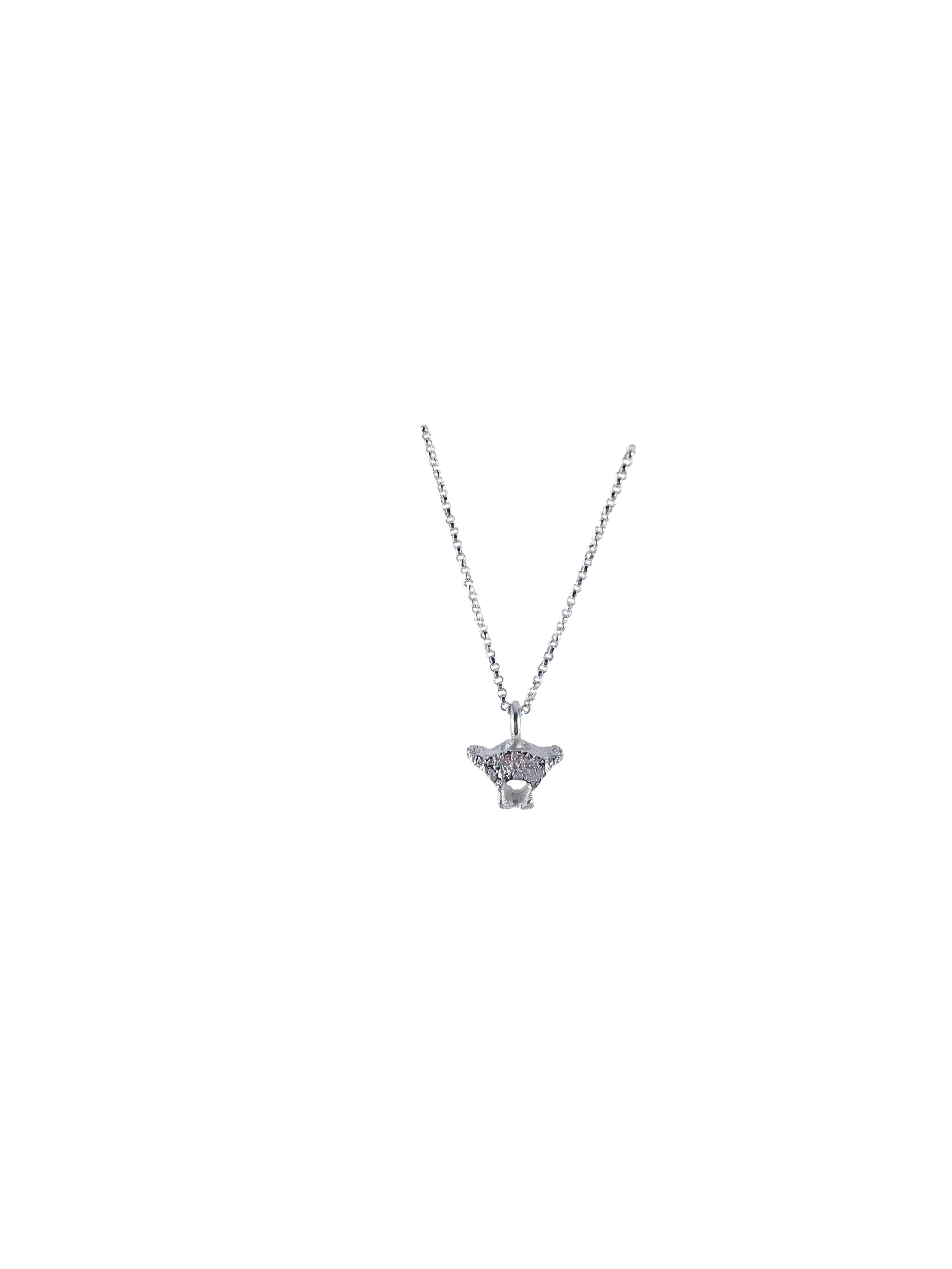 small vertebrae pendant 1 white.jpg