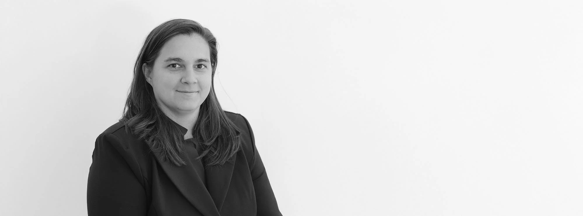Black and white wide professional headshot of Rebecca Hall, Partner at Loftin Holt Hall & Hargett LLP.
