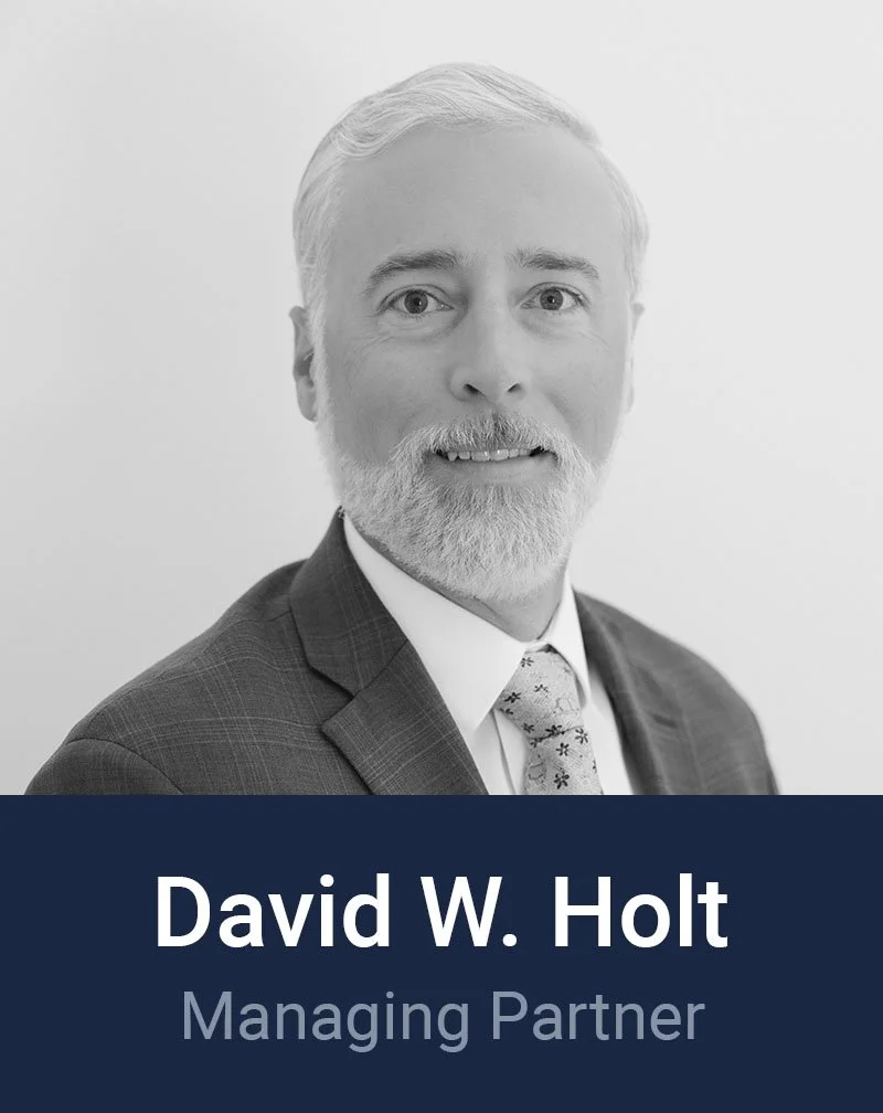 Black and white professional headshot of David W. Holt, Managing Partner at Loftin Holt Hall & Hargett LLP.