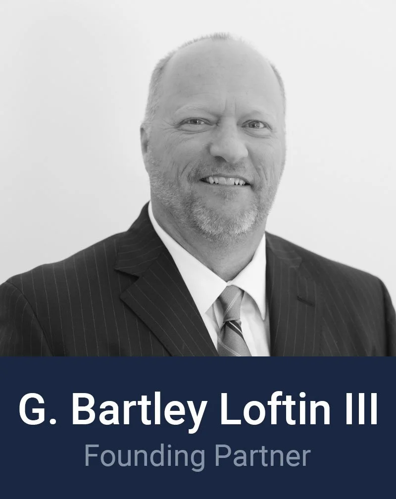 Black and white professional headshot of Bartley Loftin, Founding Partner at Loftin Holt Hall & Hargett LLP.