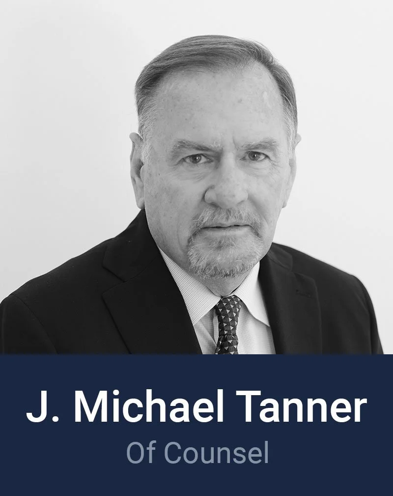 Black and white professional headshot of Michael Tanner, Of Counsel at Loftin Holt Hall & Hargett LLP.