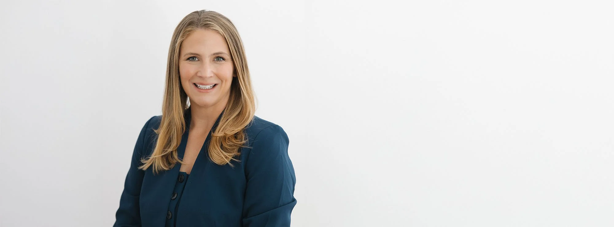 Wide professional headshot of Angela Schaefer, Partner at Loftin Holt Hall & Hargett LLP.