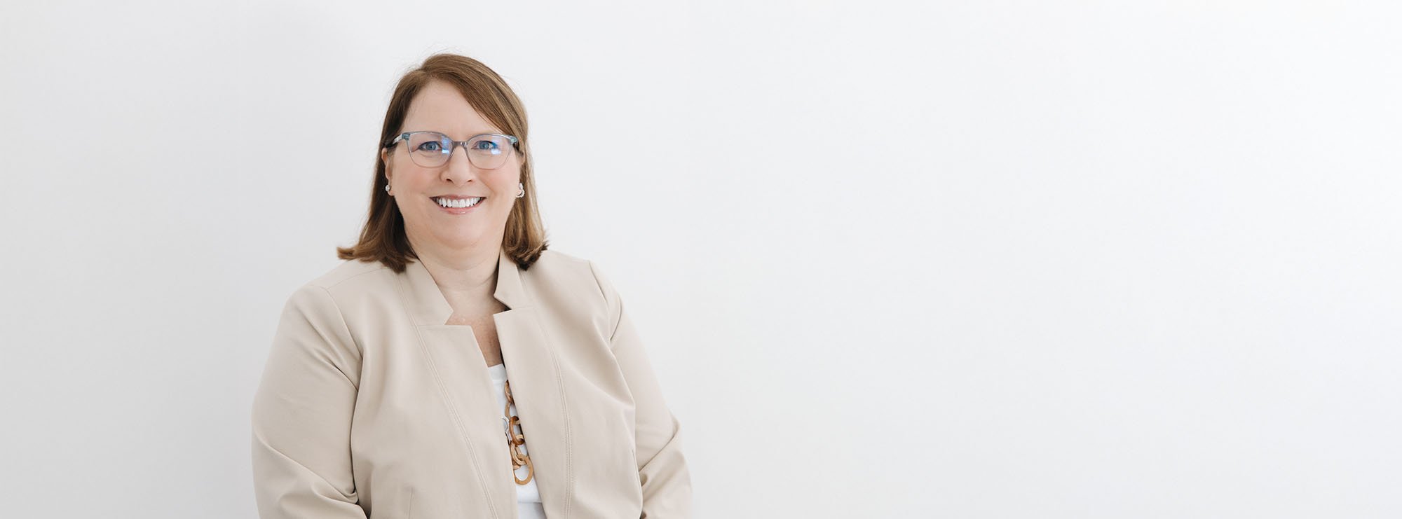Wide professional headshot of Elizabeth Hamrick, Of Counsel at Loftin Holt Hall & Hargett LLP.