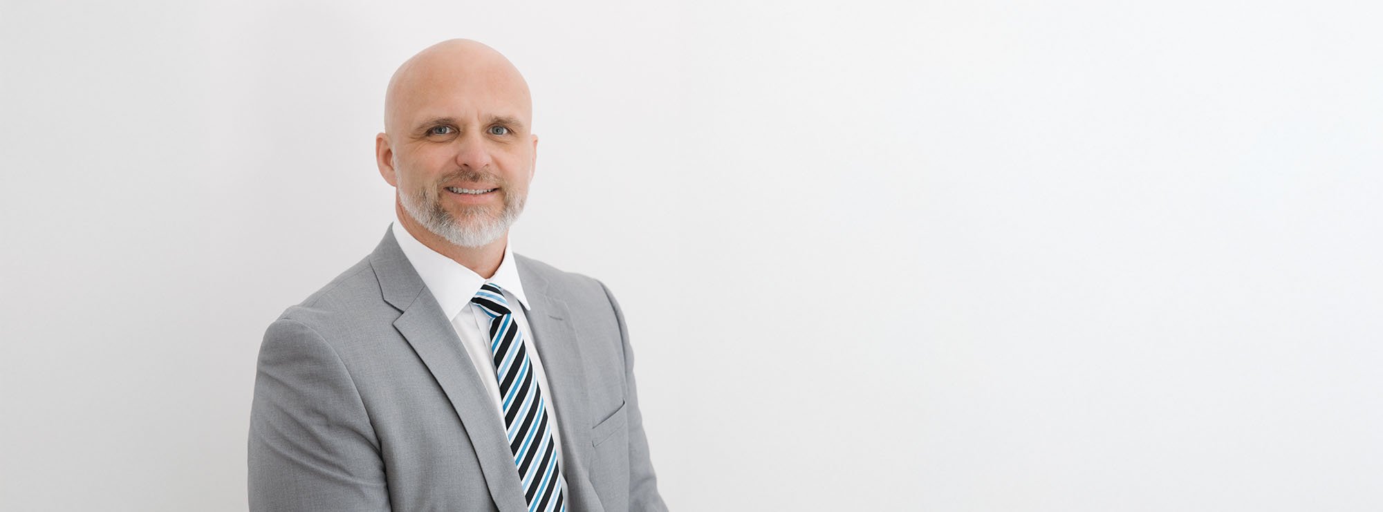 Wide professional headshot of Douglas Hargett, Partner at Loftin Holt Hall & Hargett LLP.