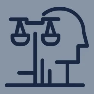 Line drawing of a human head profile with scales of justice inside it.