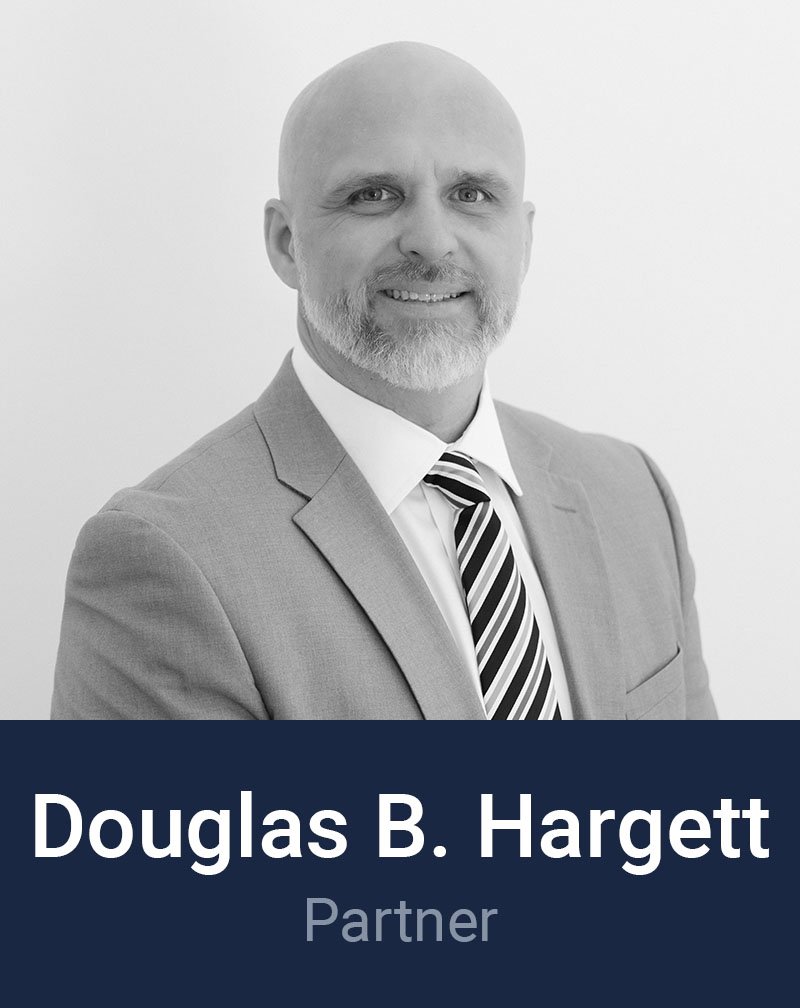 Black and white professional headshot of Douglas Hargett, Partner at Loftin Holt Hall & Hargett LLP.
