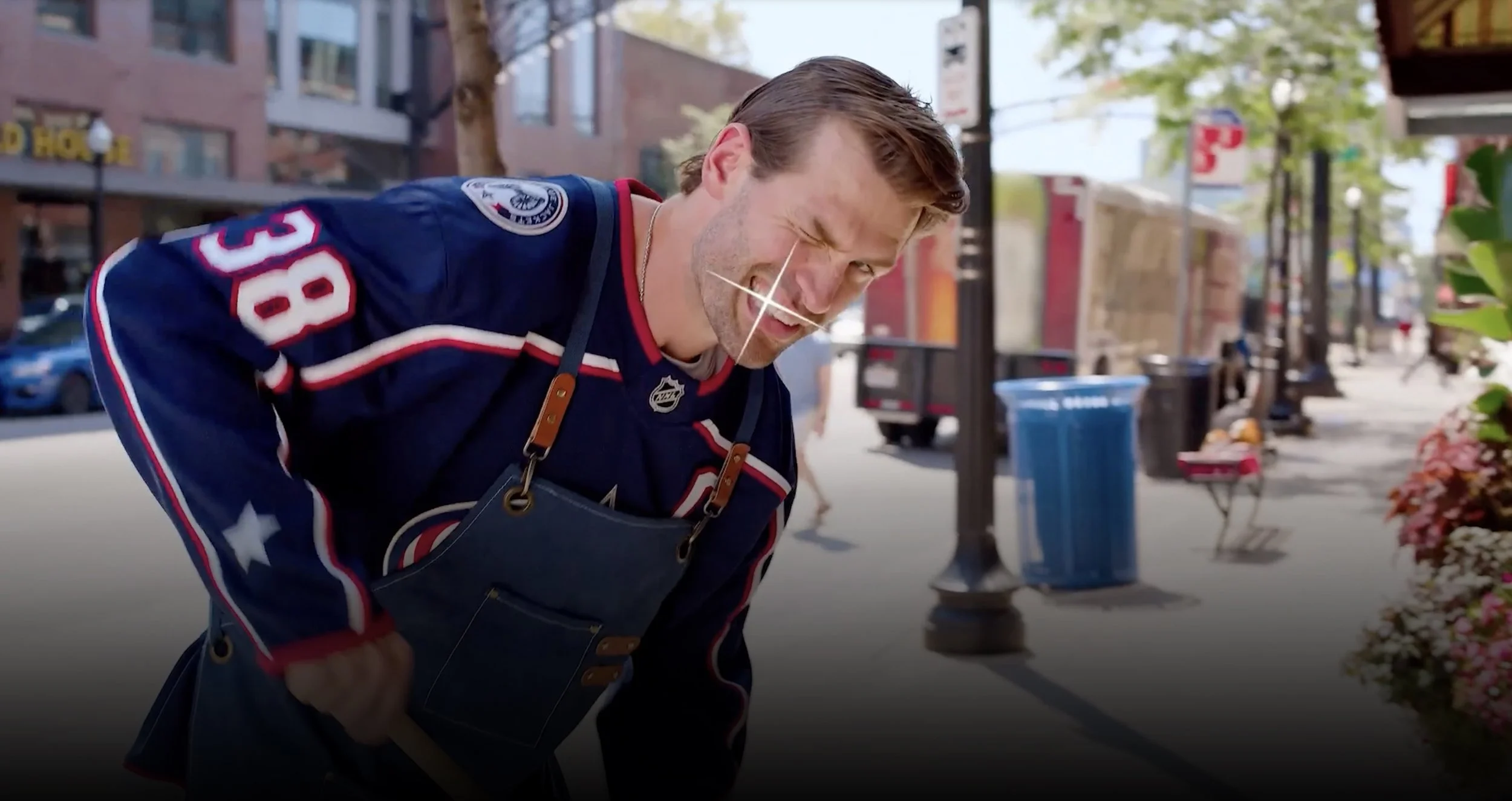 Hockey player smiling at camera