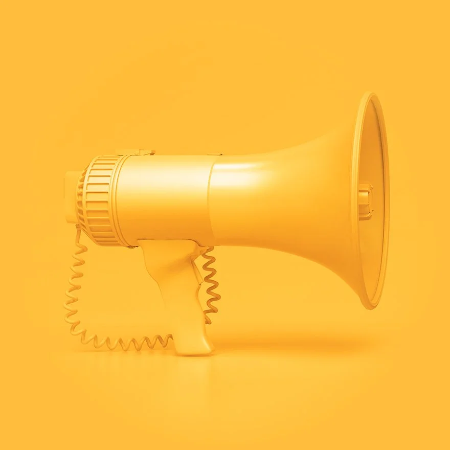 A yellow megaphone on a yellow background