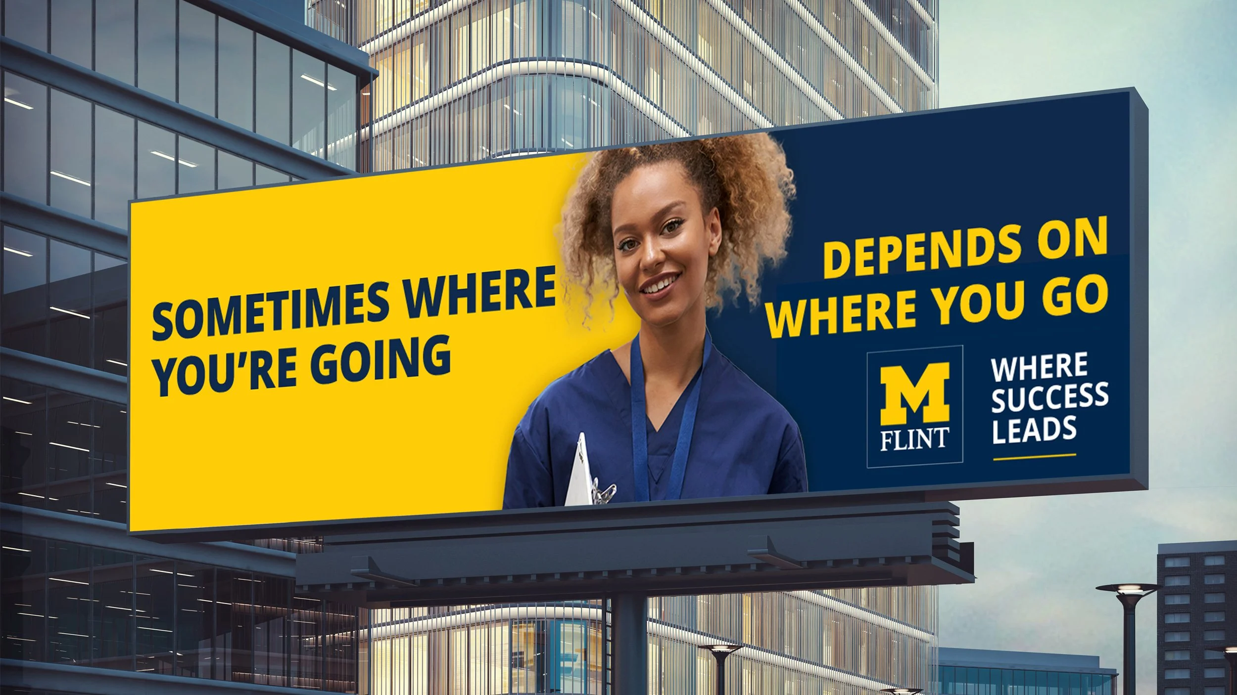 A UM-Flint billboard of a nurse surrounded by text, "sometimes where you're going depends on where you go."