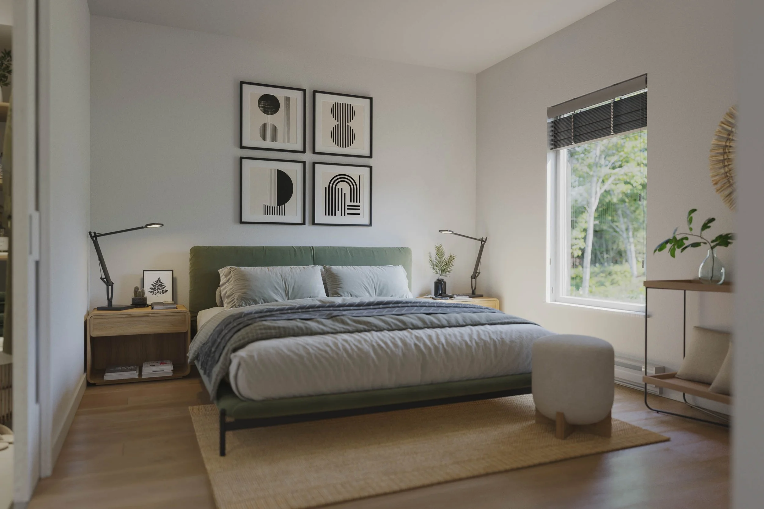 A modern bedroom with a green upholstered bed, white and gray bedding, two black bedside lamps, framed black-and-white abstract art on the wall, a window with black blinds showing green trees outside, and a wooden nightstand with decor and books.