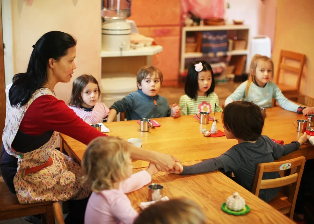 early-childhood-Hambrick-with-students.webp