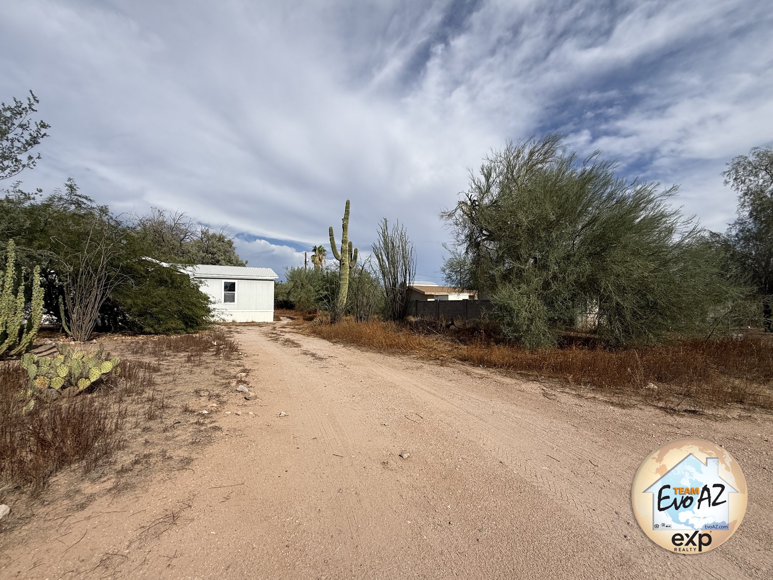 Apache Junction home with no HOA front exterior on a large 0.42 acre desert lot