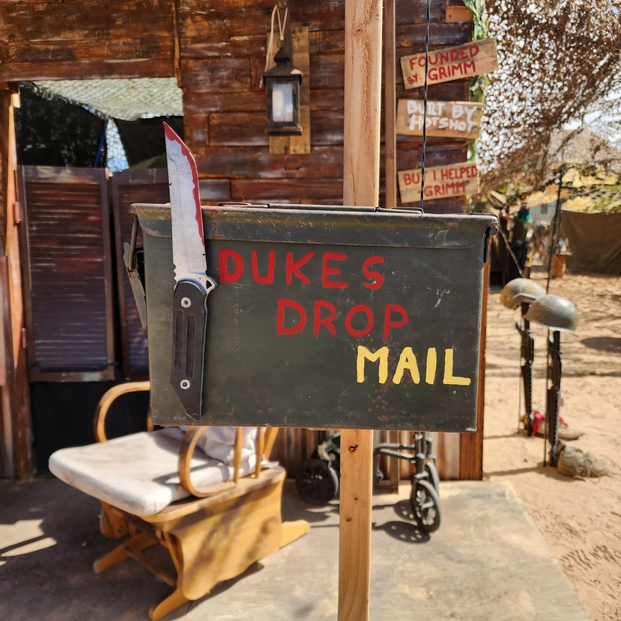 A surplus ammo can painted with Dukes Drop Mail