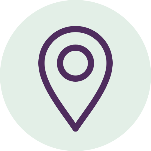 Map location icon with a purple pin inside a light green circular background.