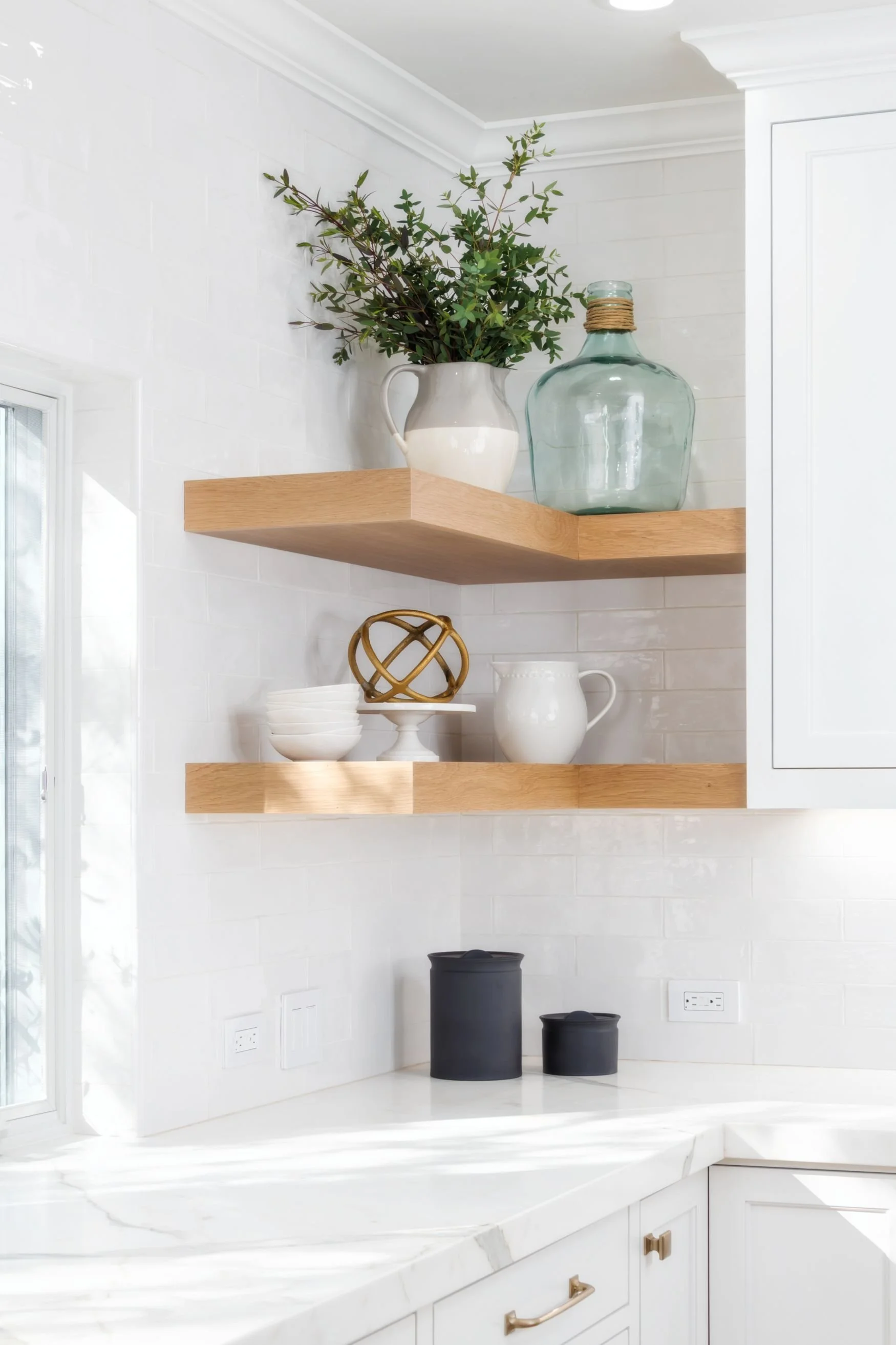 Corner floating white oak shelving for storage