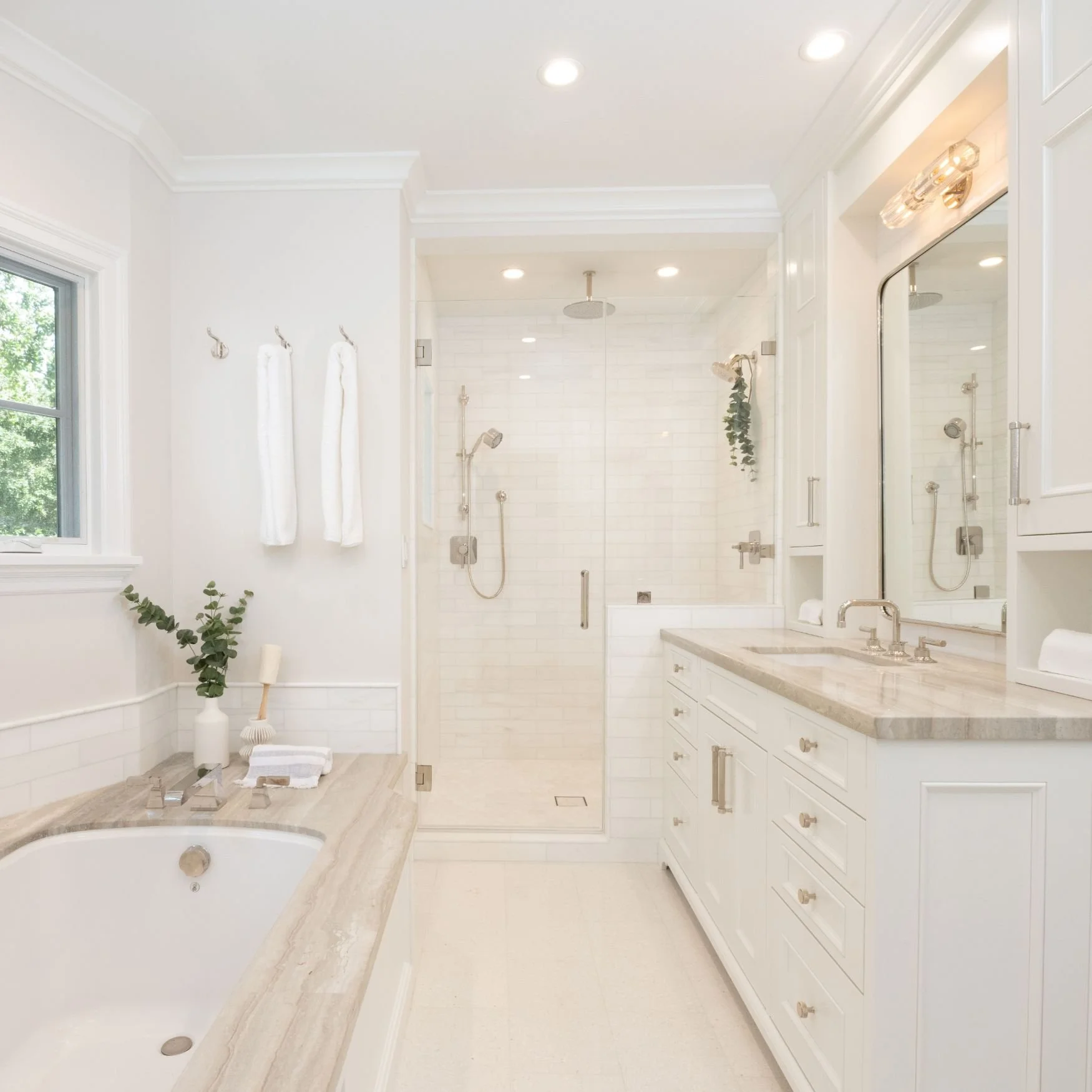 large bathroom with walk in shower and built-in tub