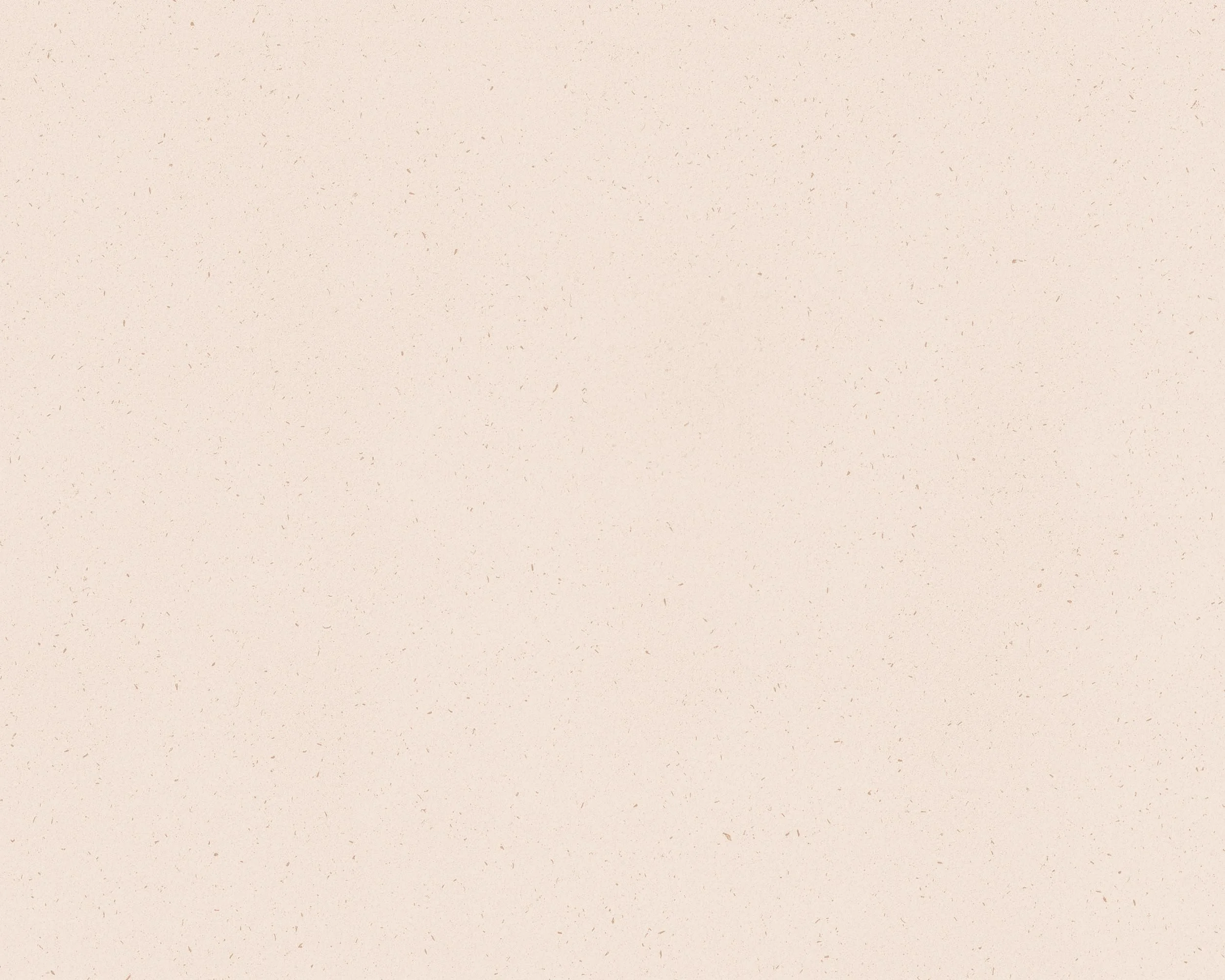A piece of textured paper in light coral with peach tones.