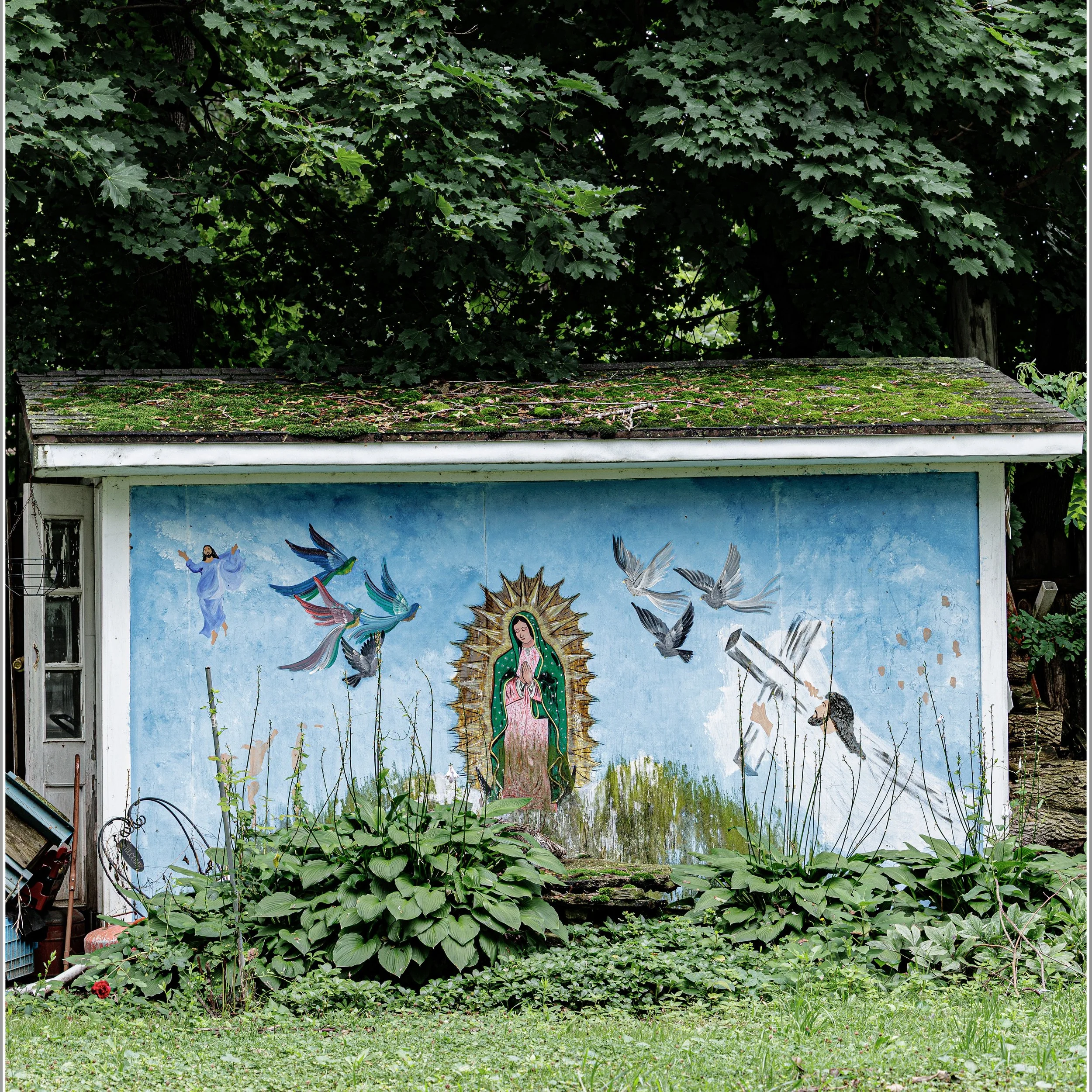 Another shrine. This one is a painted mural on a 'She-Shed' or a detached workshop. 
Waukegan has its share of shrines.