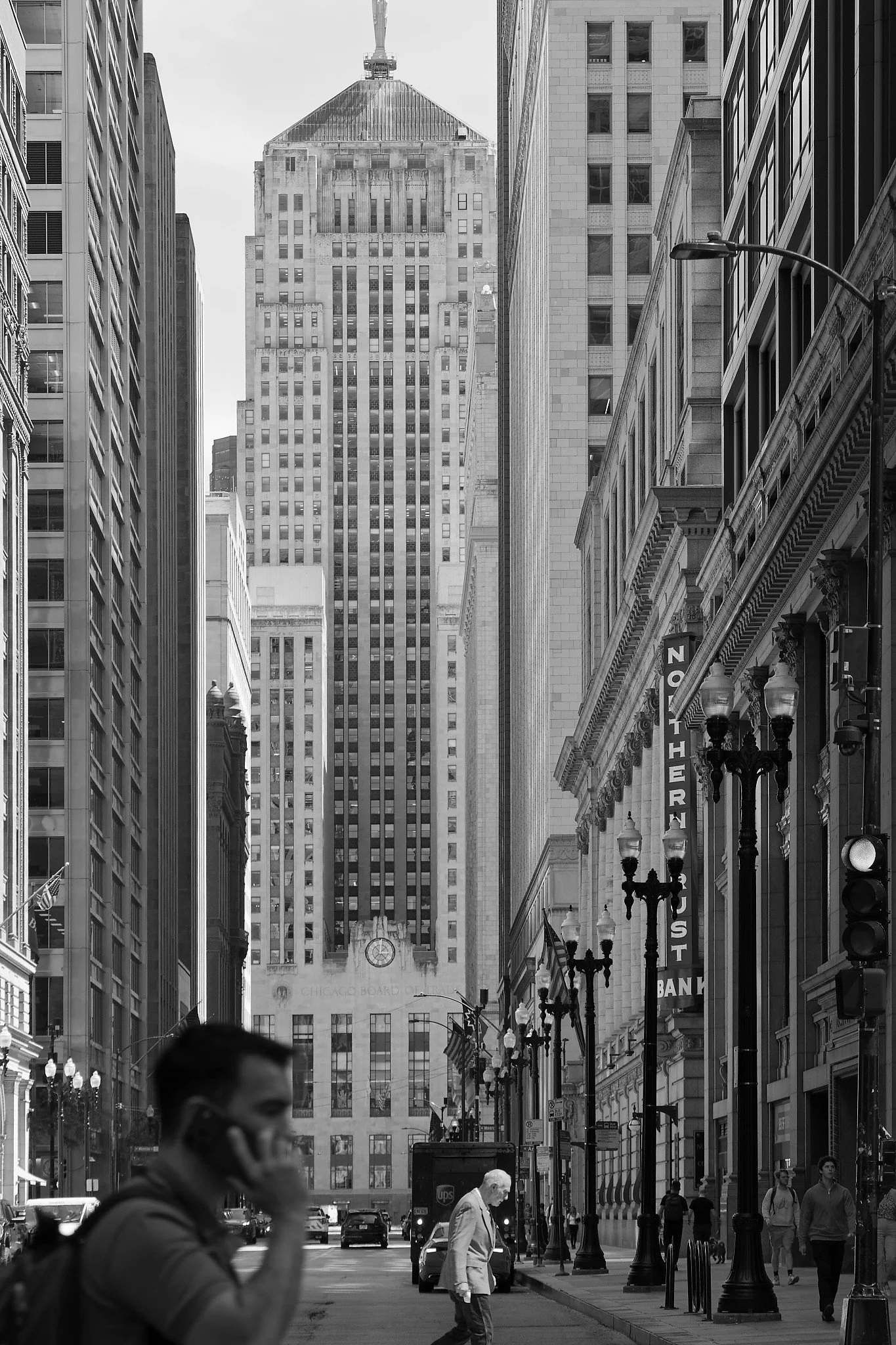 Looking south on LaSalle Street in the business district of Chicago.  Again, attempting to capture light and shadow in grayscale with the Chicago Board of Trade positioned as the bookend.