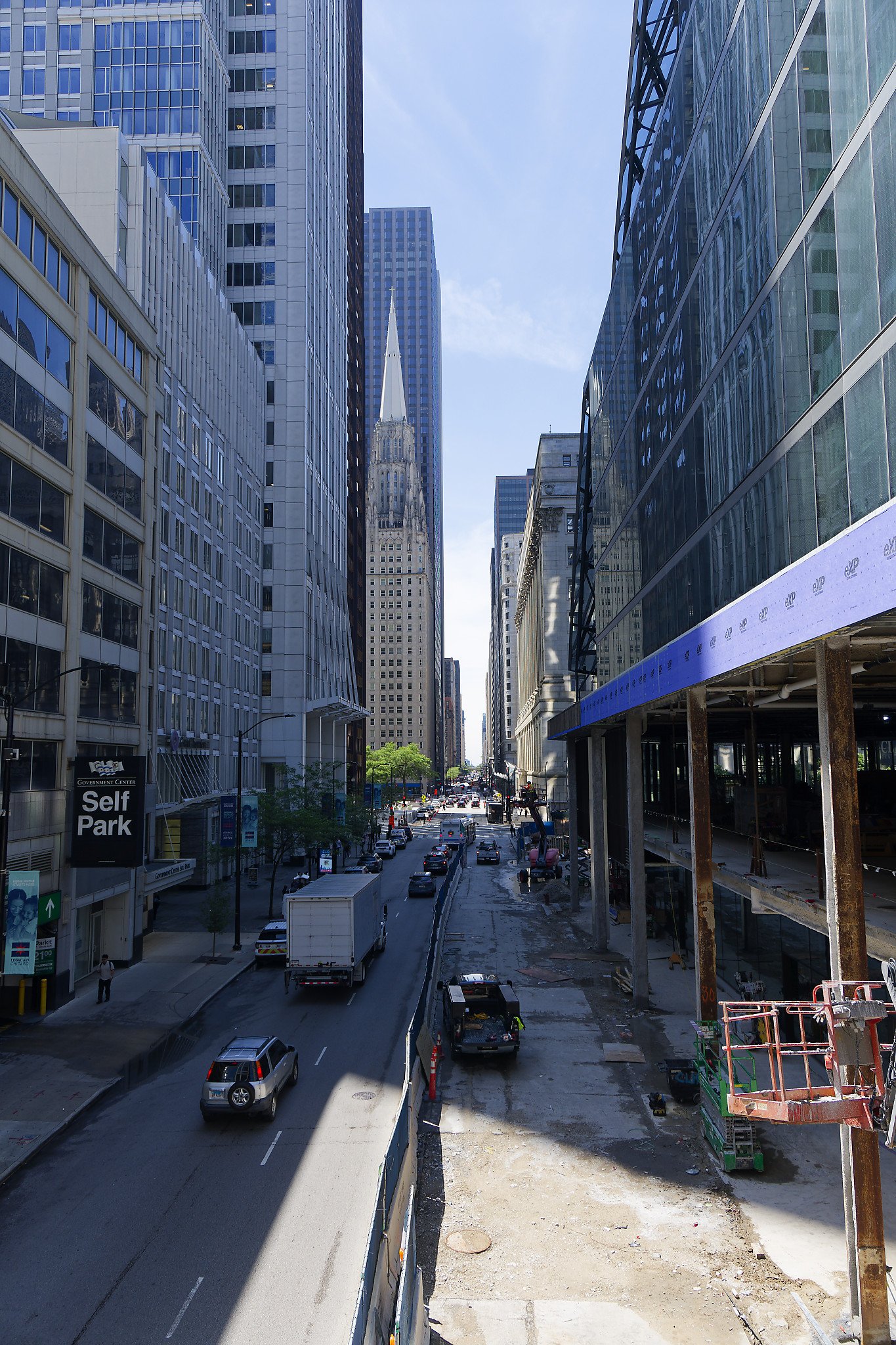 Looking south on Clark Street from the elevated train station. On the right side is a massive renovation project of the former Thompson Center into the new Chicago headquarters for Google.