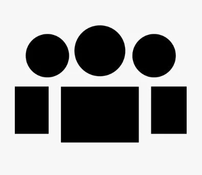 Simplified black and white icon of three people with rectangular bodies, representing a team or group.