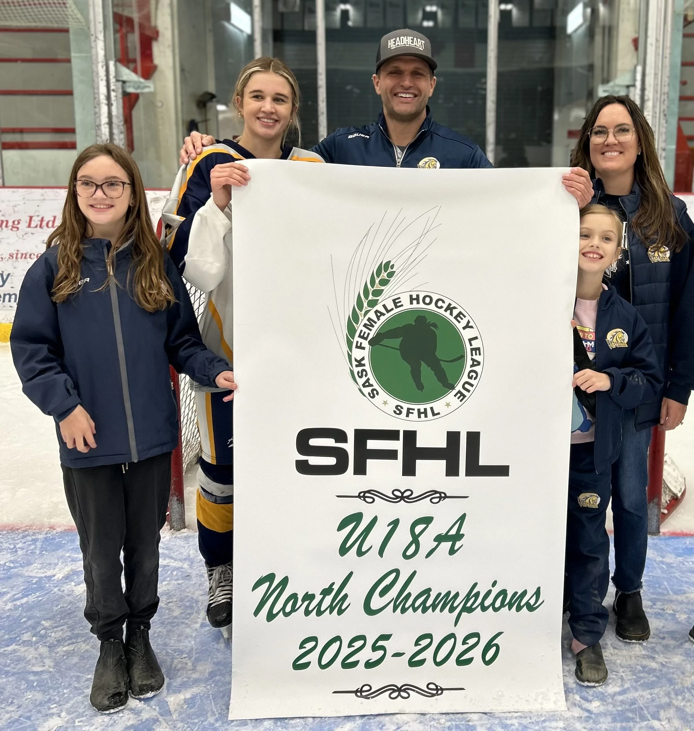 Owners of RMB, Trent and Katie Aylward with their family at the Rosetown female hockey league championship celebration.