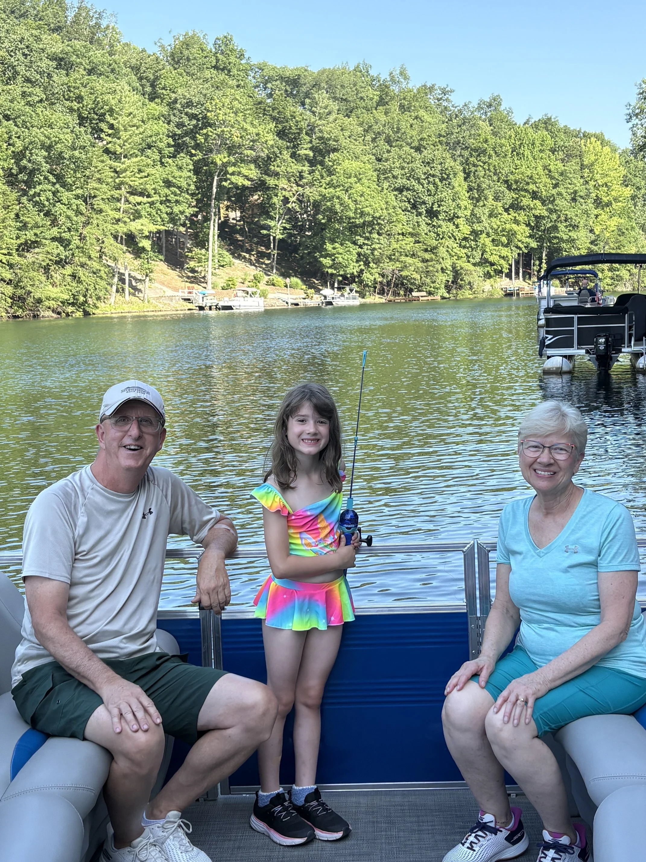 Andy Whirl with his wife and granddaughter on a lake in Fairfield Glade, Tennessee.