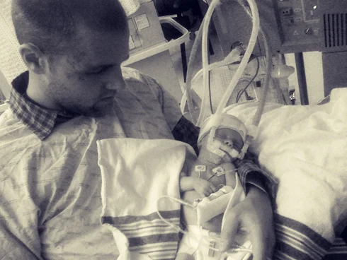 Here is Luke at four weeks old. He'd been through two surgeries, a life threatening staph infection, and a stroke. He'd just been taken off the respirator, and was my first time holding him. I could have sat there for days.