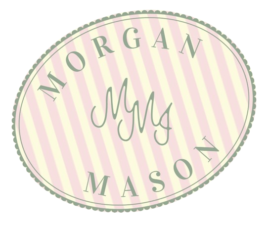 A circular sticker with a pink and white striped background that reads 'MOM' at the center and 'NORGAM MY MASON' around the border.
