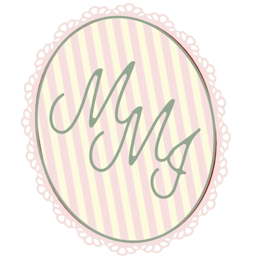 A decorative sign with the words "My M" written in script font inside an oval shape, with a pastel pink and green striped background and lace-like border.