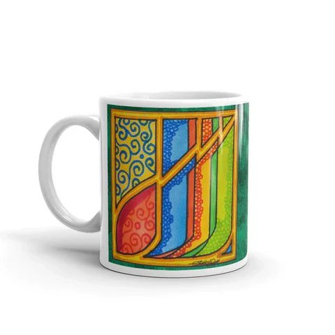 Colorful ceramic mug with an abstract design featuring swirls, lines, and geometric shapes in yellow, blue, red, and green.