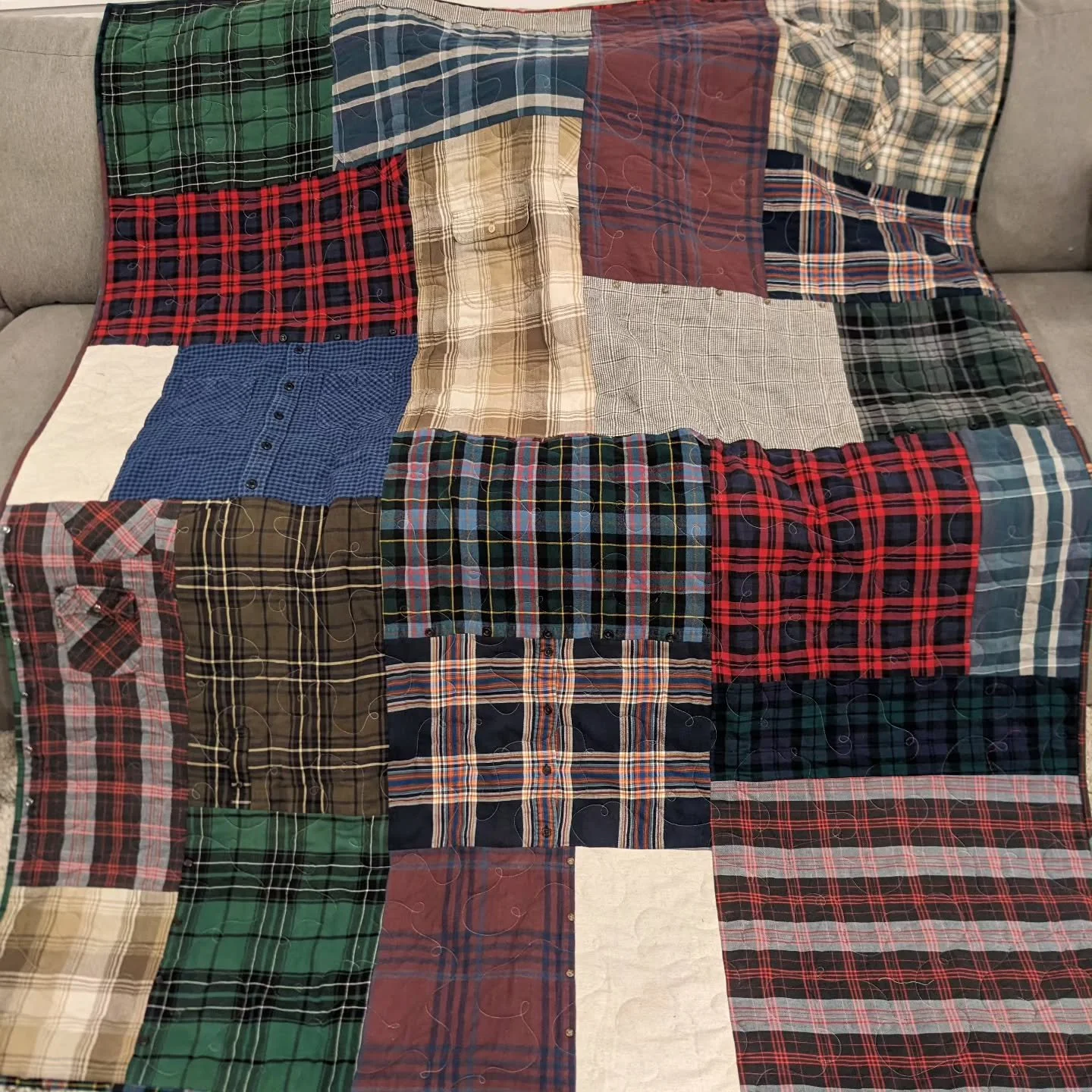 Flannel shirt quilt! Buttons, pockets and all.

The binding and back (forgot to take a picture) were also made from shirts, and I pieced the batting from scraps. So this one was pretty much 100% upcycled.

#quilting #quiltersofinstagram #upcycledclot