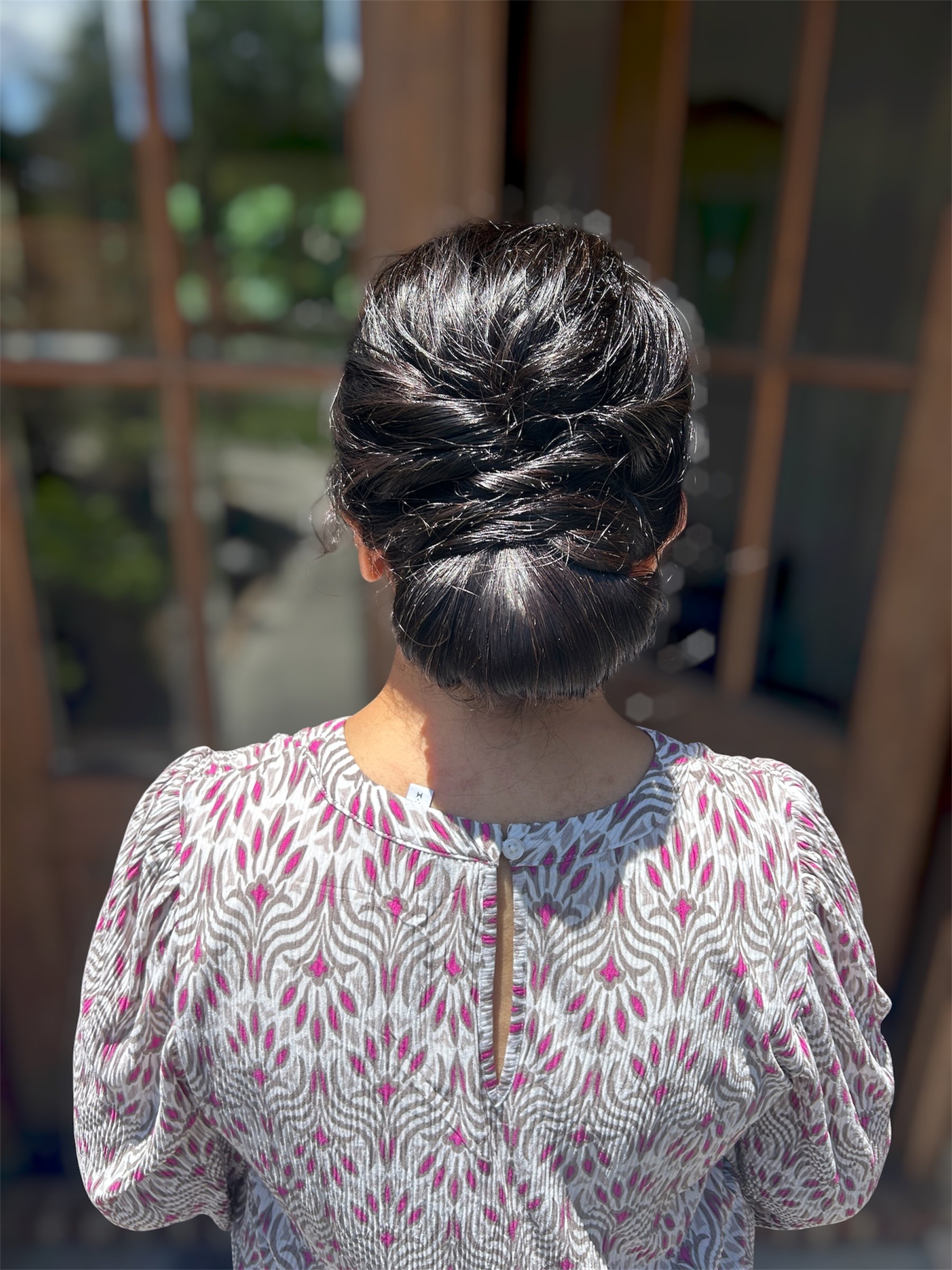 Low bun mother of the bride hair in knoxville tenneessee