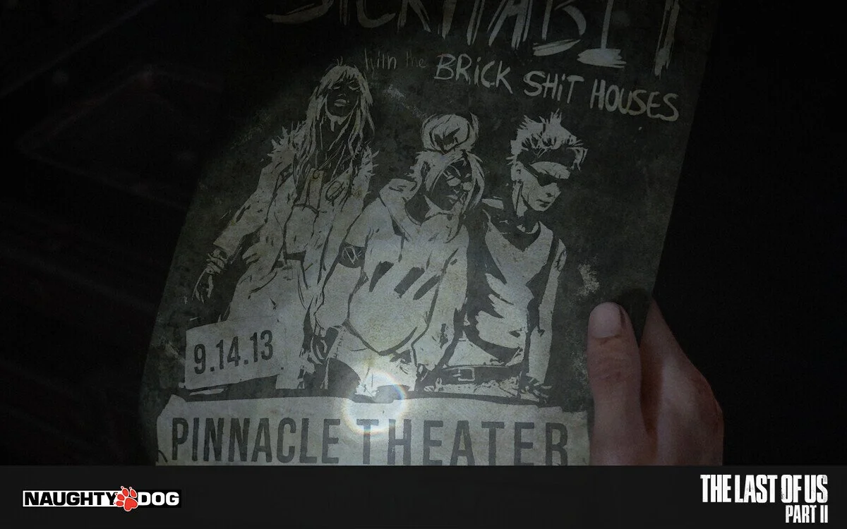 A band poster featuring three illustrated characters.