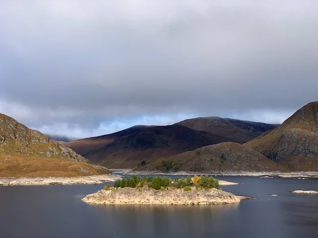 outer-hebrides-loch-island-mountains.webp