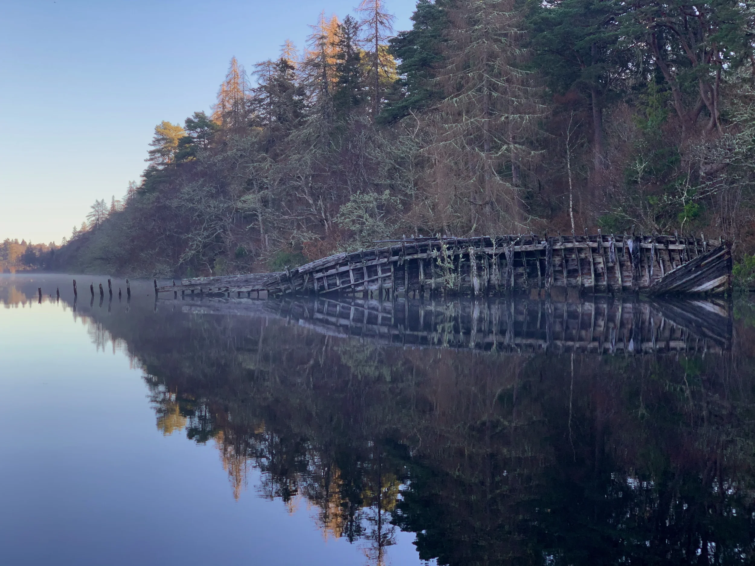 loch-dochfour-shipwreck-reflection.webp