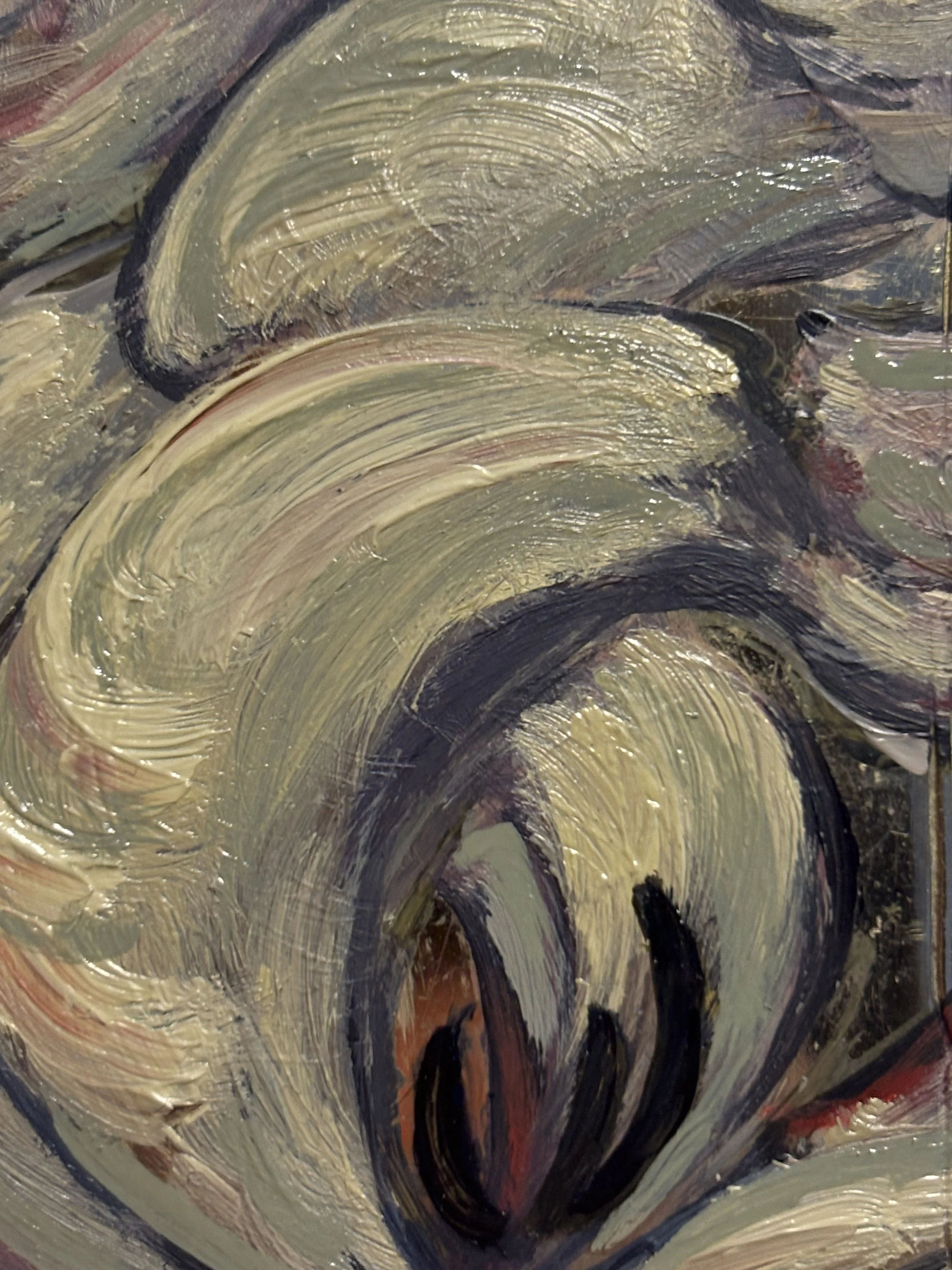 Close-up of an abstract painting with swirling brushstrokes in gold, black, white, and hints of red and purple.