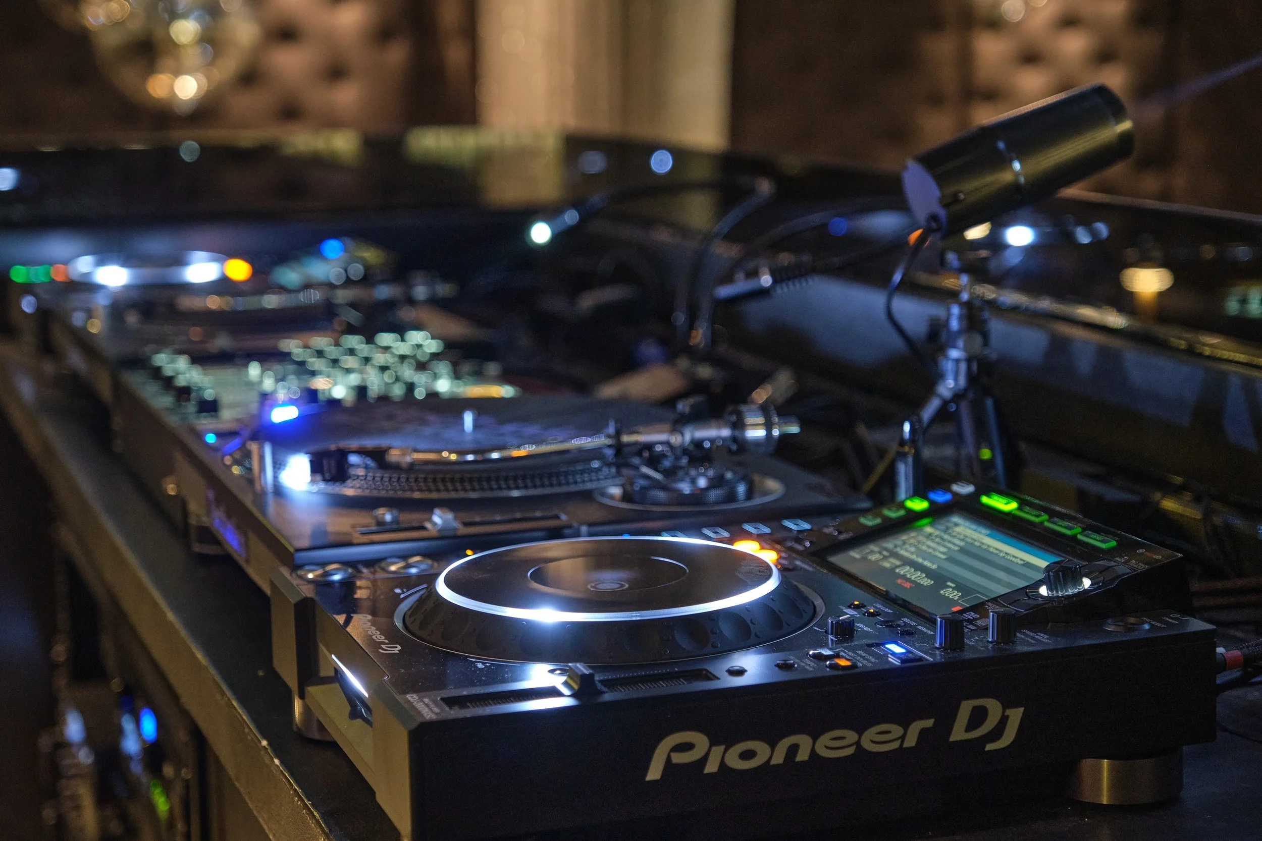 The DJ booth and turntables at Stardust