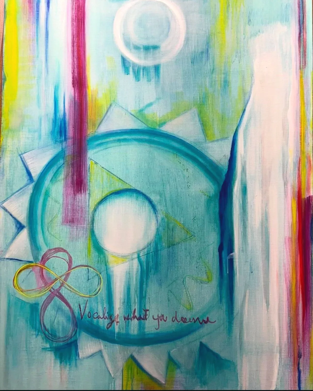 Abstract colorful drawing featuring geometric shapes like circles, triangles, and infinity symbols, with a motivational quote: "Vocalize what you dream."