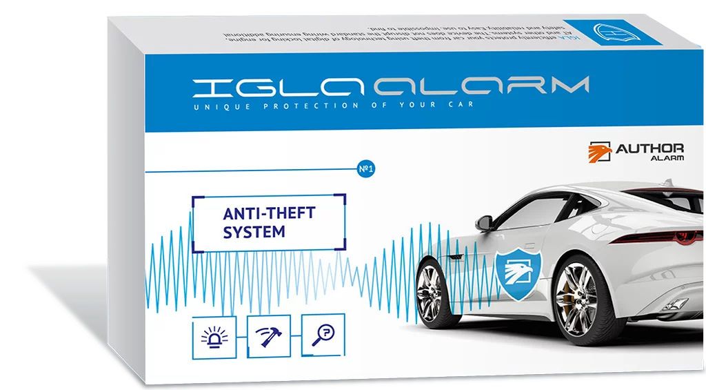 Packaging box for IGL ALARM anti-theft car security system, with a graphic of a white car and a blue shield emblem, and icons for lights, alarm, and speed on the front.